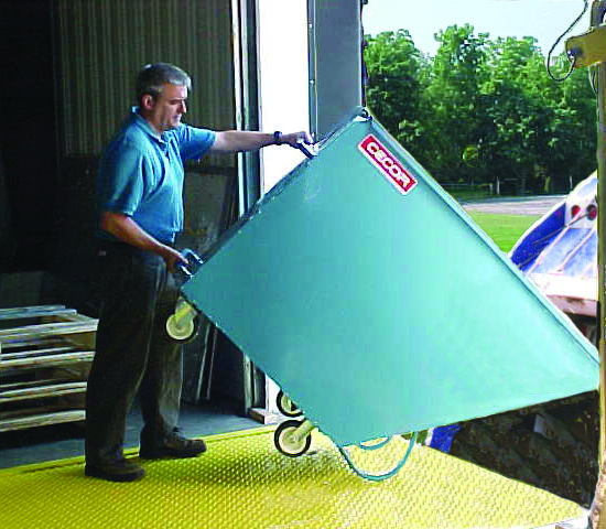 Dumping Hoppers and Tilt Trucks: Streamlining Material Handling with CECOR’s Industrial Solutions